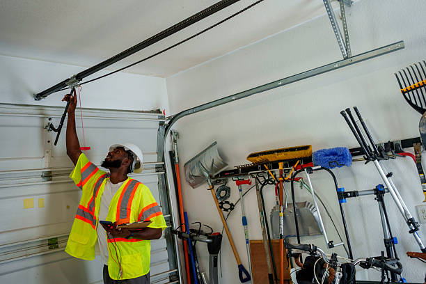 Professional Garage Door Roller Replacement technician working in Springfield, MI